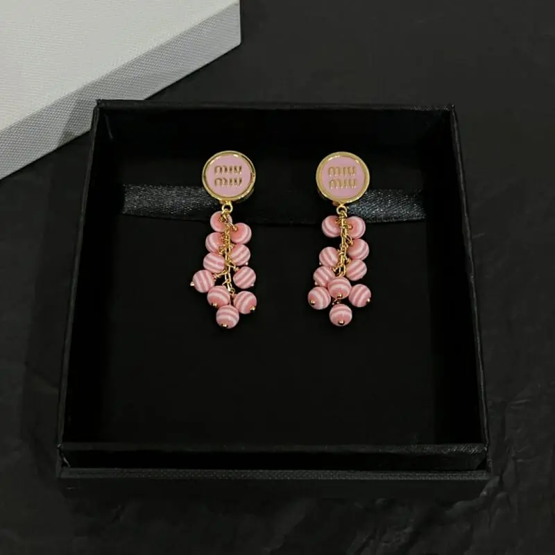 miu miu boucles doreilles pour femme s_12240514